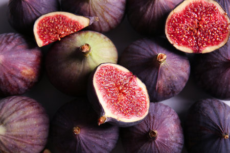 Texture of fresh ripe figs as backgroundの写真素材