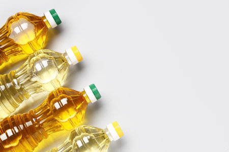 Bottles of sunflower oil on white backgroundの写真素材