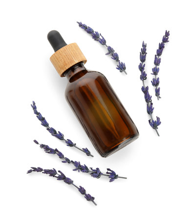 Composition with bottle of lavender essential oil isolated on white background, closeupの写真素材