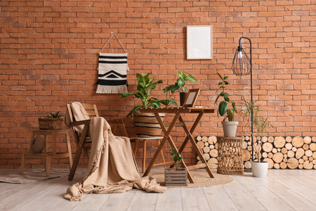 Interior of room with wooden chair, table and plantsの写真素材