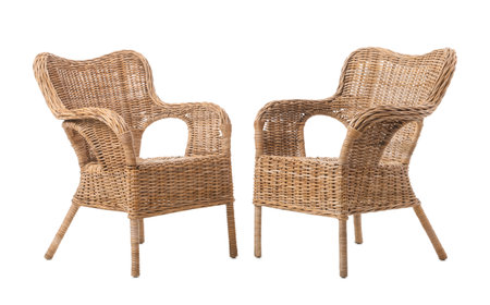 Wicker armchairs on white backgroundの写真素材