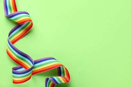 Rainbow ribbon on green background. LGBT conceptの写真素材