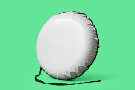 Snow tube on a green backgroundの写真素材