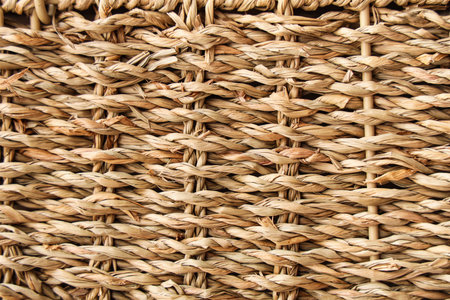 Wicker rattan texture as background, top view