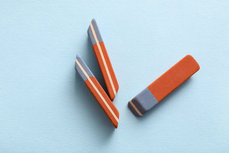 School erasers on blue backgroundの写真素材