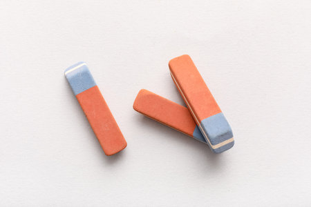 School erasers on white background