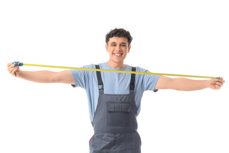 Male worker with tape measure on white background