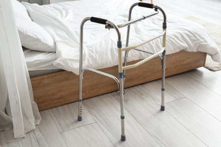 Medical walker on floor in bedroom