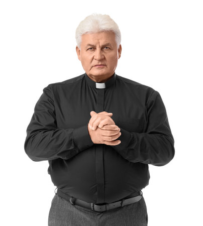 Senior priest praying on white background