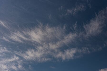 Clouds in the sky. The wonderful spectacle of a sky full of clouds. Depth and three-dimensionality of a cloudy sky.の写真素材