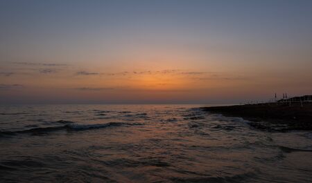 Adriatic sea. Ostuni, Puglia. Sunrise. Renowned seaside resort located in the heart of Salento. This stretch of coast is punctuated by a series of rocky beachesの写真素材