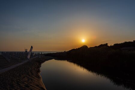 Adriatic sea. Ostuni, Puglia. Sunrise. Renowned seaside resort located in the heart of Salento. This stretch of coast is punctuated by a series of rocky beachesの写真素材