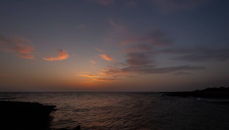 Adriatic sea. Ostuni, Puglia. Sunrise. Renowned seaside resort located in the heart of Salento. This stretch of coast is punctuated by a series of rocky beachesの写真素材