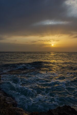 Adriatic sea. Ostuni, Puglia. Sunrise. Renowned seaside resort located in the heart of Salento. This stretch of coast is punctuated by a series of rocky beachesの写真素材