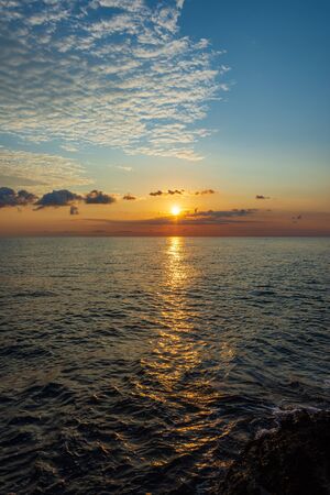 Adriatic sea. Ostuni, Puglia. Sunrise. Renowned seaside resort located in the heart of Salento. This stretch of coast is punctuated by a series of rocky beachesの写真素材