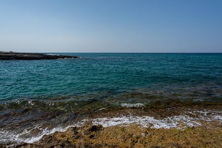 Ostuni, Brindisi, Puglia. Fantastic view of the clear and clear waters and of the wonderful coasts of the Adriatic sea.の写真素材
