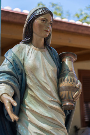 Wooden statue of the Virgin Mary, Mother of Jesus Christの写真素材