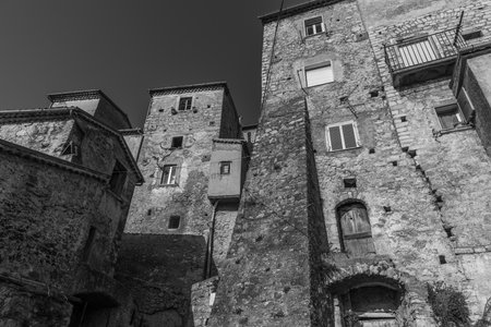 Pesche, village in the province of Isernia, in Molise, perched along the steep slopes of Mount San Marco, a white spot against the green of the mountain and the gray of the stones.の写真素材