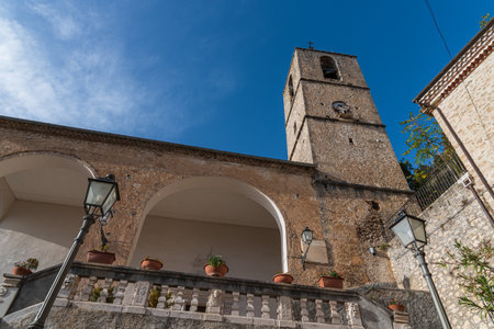 Pesche, village in the province of Isernia, in Molise, perched along the steep slopes of Mount San Marco, a white spot against the green of the mountain and the gray of the stones.の写真素材