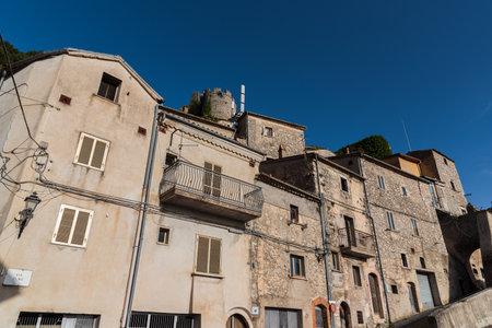 Pesche, village in the province of Isernia, in Molise, perched along the steep slopes of Mount San Marco, a white spot against the green of the mountain and the gray of the stones.の写真素材