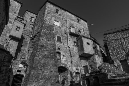 Pesche, village in the province of Isernia, in Molise, perched along the steep slopes of Mount San Marco, a white spot against the green of the mountain and the gray of the stones.の写真素材