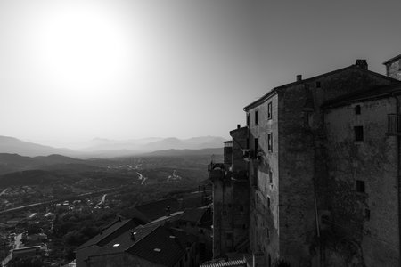 Pesche, village in the province of Isernia, in Molise, perched along the steep slopes of Mount San Marco, a white spot against the green of the mountain and the gray of the stones.の写真素材
