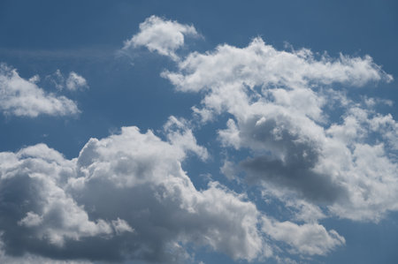 Clouds in the sky. The wonderful spectacle of a sky full of clouds. Depth and three-dimensionality of a cloudy sky.の写真素材