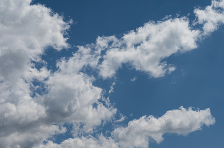 Clouds in the sky. The wonderful spectacle of a sky full of clouds. Depth and three-dimensionality of a cloudy sky.の写真素材