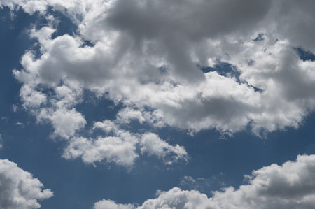 Clouds in the sky. The wonderful spectacle of a sky full of clouds. Depth and three-dimensionality of a cloudy sky.の写真素材
