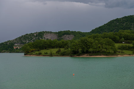 The lake of Castel S. Vincenzo is an artificial basin built in the late 1950s for hydroelectric purposes. The lake has an area of 6,140 kmÂ² and has a capacity of 10 million cubic metresの写真素材