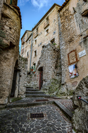 Pesche, village in the province of Isernia, in Molise, perched along the steep slopes of Mount San Marco, a white spot against the green of the mountain and the gray of the stones.の写真素材