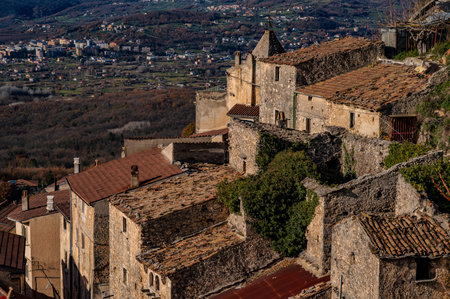 Pesche, village in the province of Isernia, in Molise, perched along the steep slopes of Mount San Marco, a white spot against the green of the mountain and the gray of the stones.の写真素材
