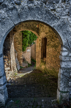 Pesche, village in the province of Isernia, in Molise, perched along the steep slopes of Mount San Marco, a white spot against the green of the mountain and the gray of the stones.の写真素材