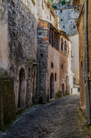 Pesche, village in the province of Isernia, in Molise, perched along the steep slopes of Mount San Marco, a white spot against the green of the mountain and the gray of the stones.の写真素材