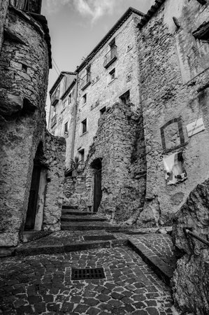 Pesche, village in the province of Isernia, in Molise, perched along the steep slopes of Mount San Marco, a white spot against the green of the mountain and the gray of the stones.の写真素材