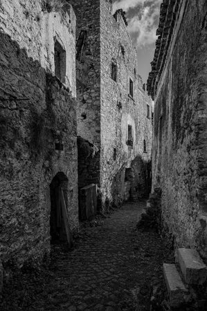 Pesche, village in the province of Isernia, in Molise, perched along the steep slopes of Mount San Marco, a white spot against the green of the mountain and the gray of the stones.の写真素材