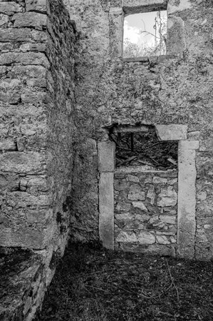 Pesche, village in the province of Isernia, in Molise, perched along the steep slopes of Mount San Marco, a white spot against the green of the mountain and the gray of the stones.の写真素材
