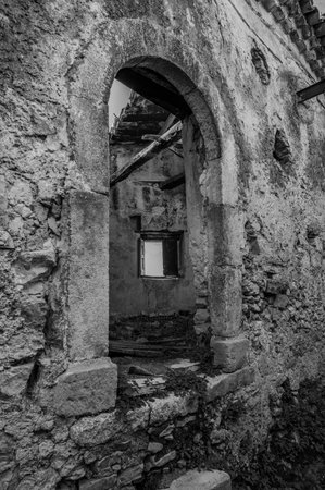 Pesche, village in the province of Isernia, in Molise, perched along the steep slopes of Mount San Marco, a white spot against the green of the mountain and the gray of the stones.の写真素材