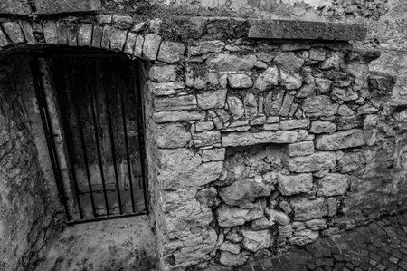 Pesche, village in the province of Isernia, in Molise, perched along the steep slopes of Mount San Marco, a white spot against the green of the mountain and the gray of the stones.の写真素材