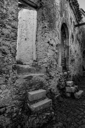 Pesche, village in the province of Isernia, in Molise, perched along the steep slopes of Mount San Marco, a white spot against the green of the mountain and the gray of the stones.の写真素材