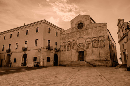 Of considerable architectural interest is the Apulian Romanesque-style cathedral where the bodies of the city's patron saints, Basso and Timoteo, are preserved.の写真素材