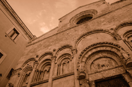Of considerable architectural interest is the Apulian Romanesque-style cathedral where the bodies of the city's patron saints, Basso and Timoteo, are preserved.の写真素材