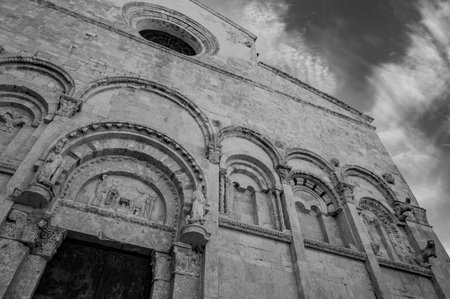 Of considerable architectural interest is the Apulian Romanesque-style cathedral where the bodies of the city's patron saints, Basso and Timoteo, are preserved.の写真素材