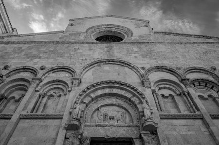 Of considerable architectural interest is the Apulian Romanesque-style cathedral where the bodies of the city's patron saints, Basso and Timoteo, are preserved.の写真素材