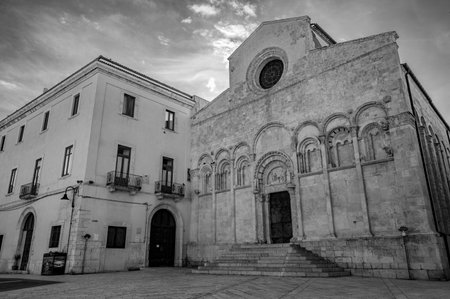 Of considerable architectural interest is the Apulian Romanesque-style cathedral where the bodies of the city's patron saints, Basso and Timoteo, are preserved.の写真素材
