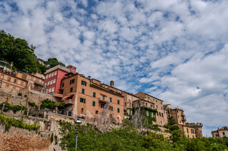 It rises on the shores of the Adriatic Sea and is located north of the mouth of the Tesino River. The town extends along the coast to the slopes of the surrounding hills.の写真素材