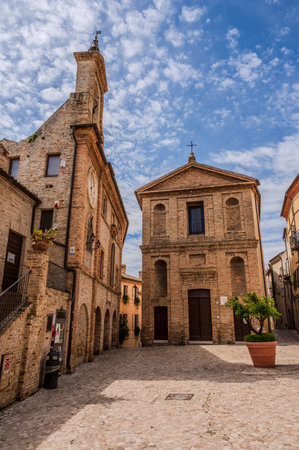 It rises on the shores of the Adriatic Sea and is located north of the mouth of the Tesino River. The town extends along the coast to the slopes of the surrounding hills.の写真素材