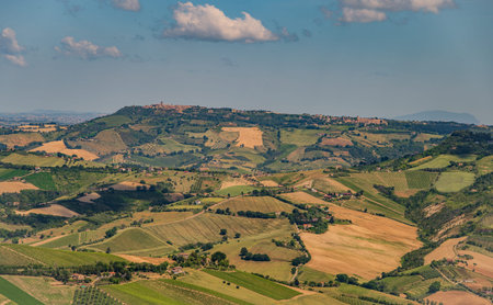 The Marche, a region of eastern Italy, rises between the Apennine mountains and the Adriatic Sea.