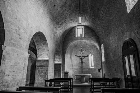 The Church of San Marziale in Gubbio is a small church located at the edge of the historic center of Gubbio, a few steps from Porta Vehia, the last remnant of the original Roman walls.の写真素材