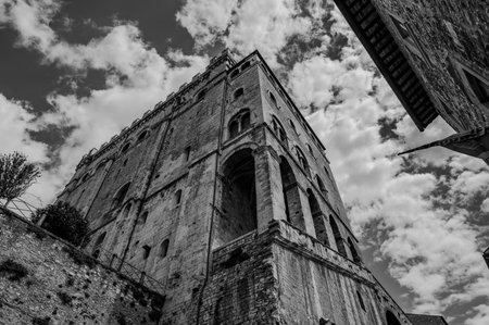 The Gothic-style Palazzo dei Consoli was built in the 14th century by the city government, which sought to demonstrate the city's grandeur and power. Since 1901, it has housed the civic museum.の写真素材